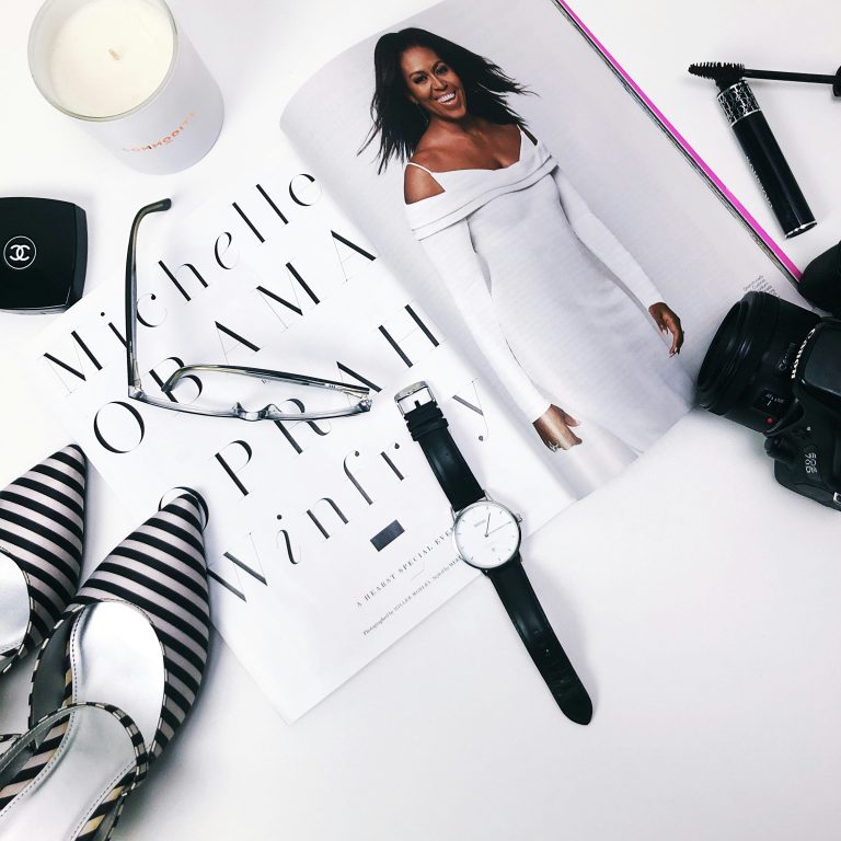 Michelle Obama wears a white dress.