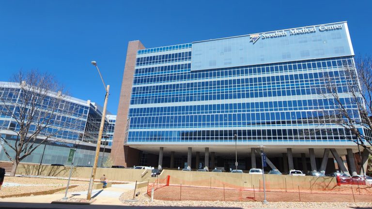 The image shows front side of the HCA HealthOne Swedish hospital.