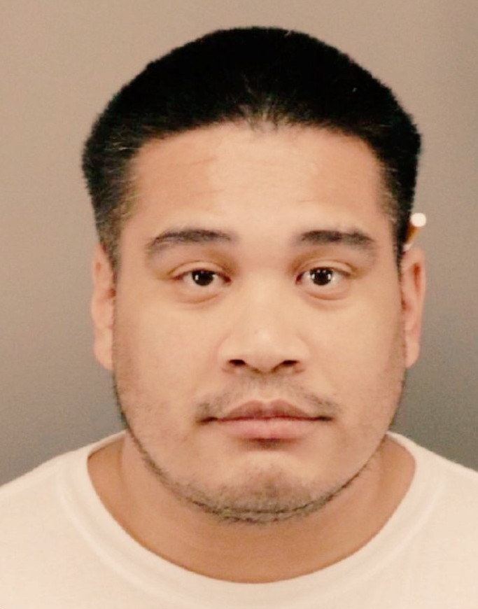 Mugshot of David Huerta, a 31-year-old male with short black hair and brown eyes, wearing a white shirt against a neutral background.