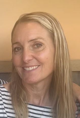 A 52-year-old White female, Amy Hillyard, with long blonde hair, standing 5'4" tall and weighing 120 pounds.