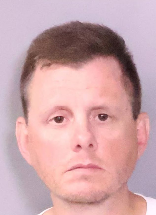 Booking photograph of 40-year-old Roland Edward Bain of Sacramento, California, following a guilty plea for sexual exploitation of a minor in federal court.