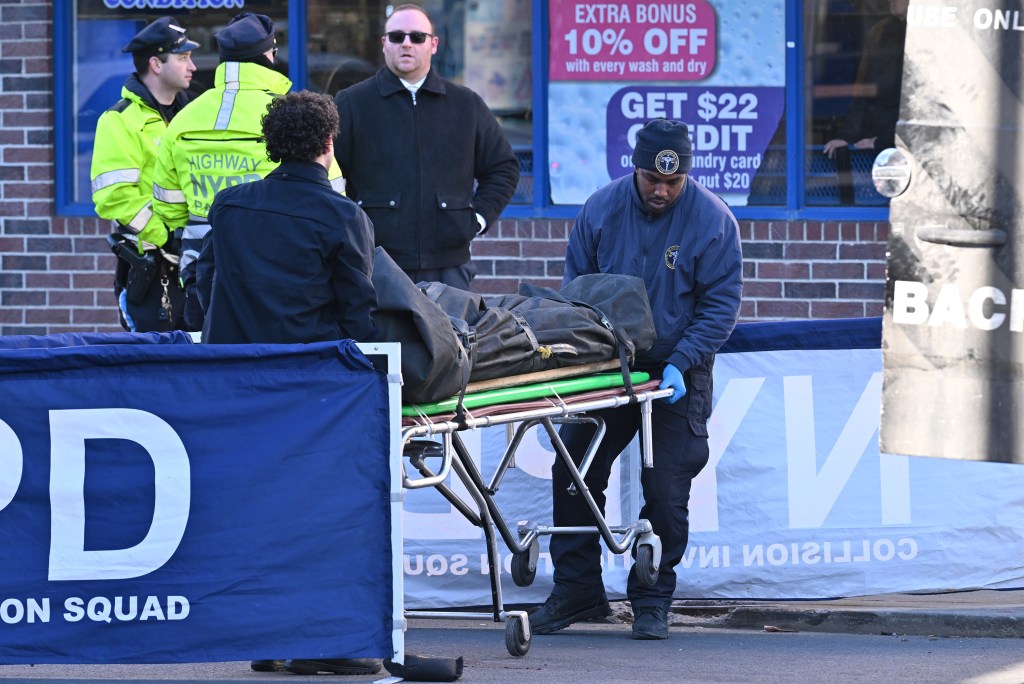 Emergency personnel and police officers at the scene of a fatal hit-and-run in Brooklyn.