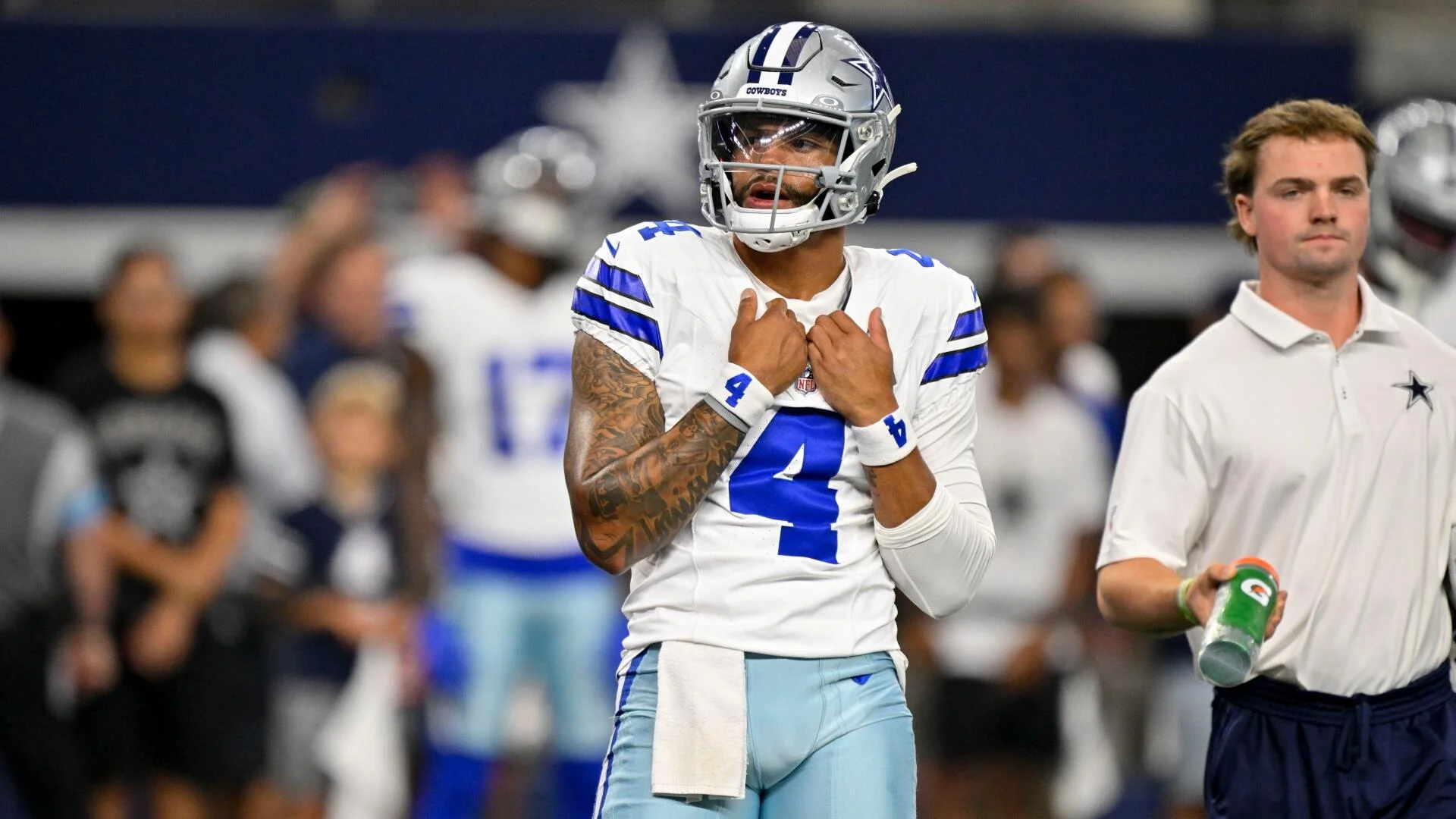 Dallas Cowboys white jersey.
