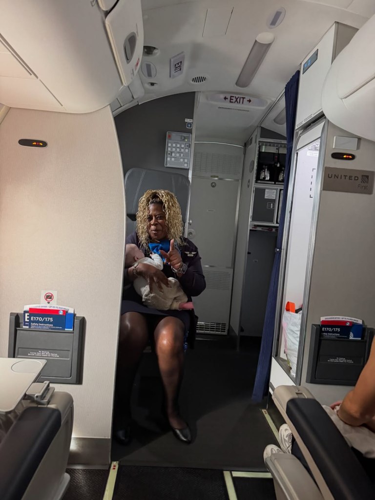Flight attendant catches baby.