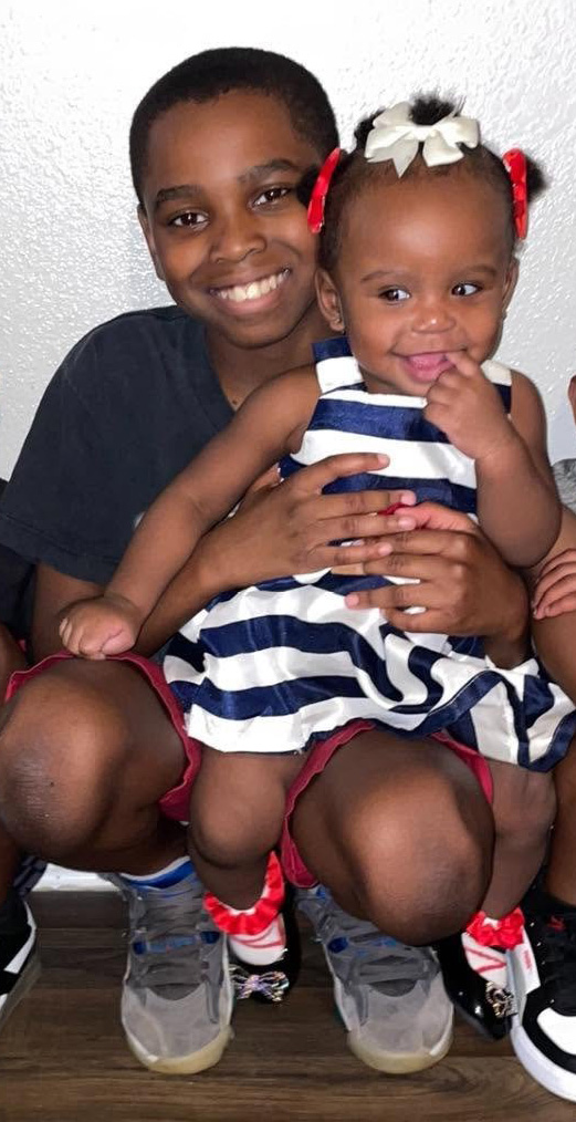 ‘Hero’ 13 year old killed shielding younger sister from shooting