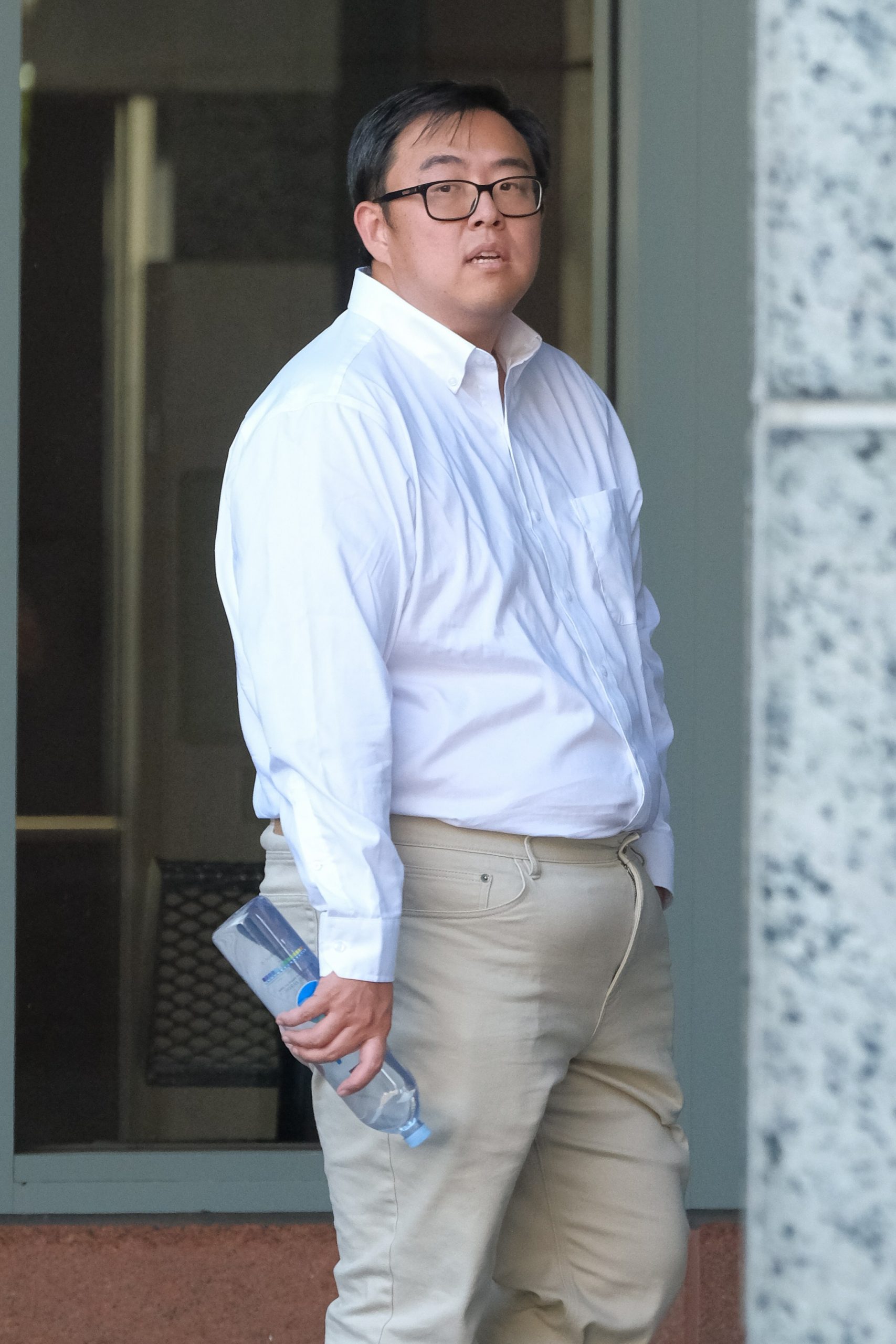 Husband of Chinese spy who allegedly stalked Taiwan president’s son for communist regime dodges questions at court