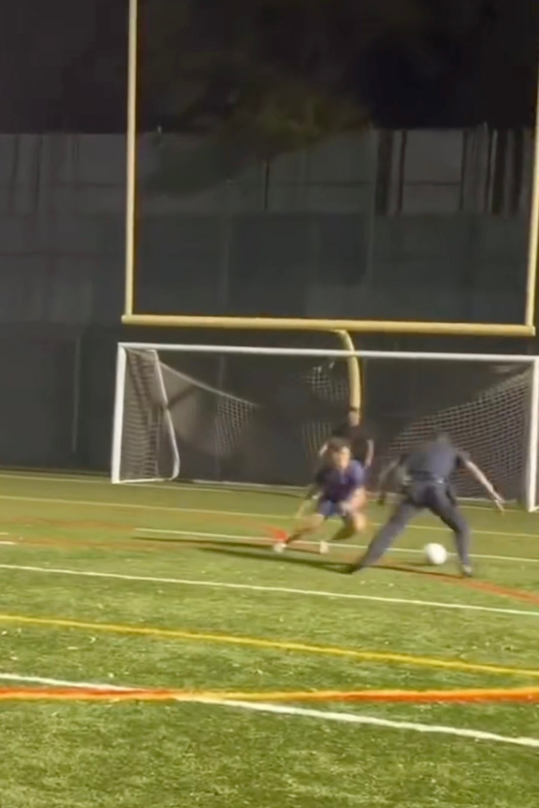 Viral video shows Long Island cop school kids in soccer while wearing full uniform